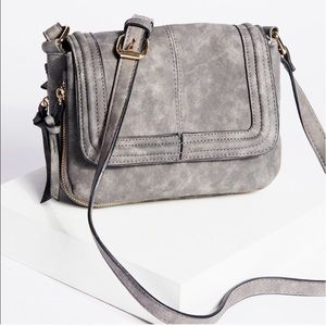 Free People line violet ray is the Mila bag